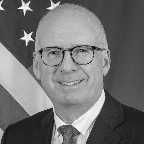 Headshot of person/agency from State Department